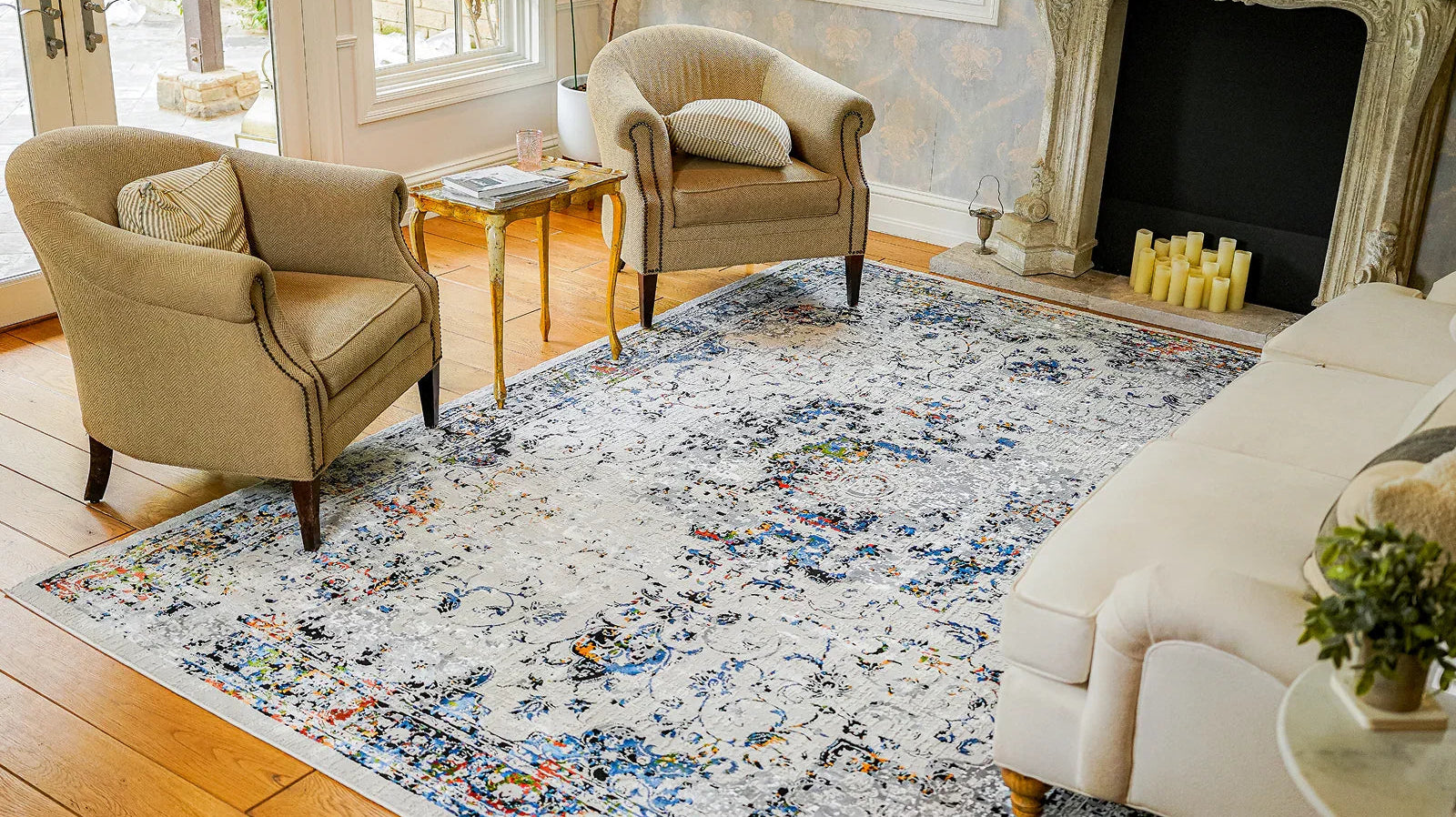 Modern living room with a colorful Turkish washable area rug on hardwood floor