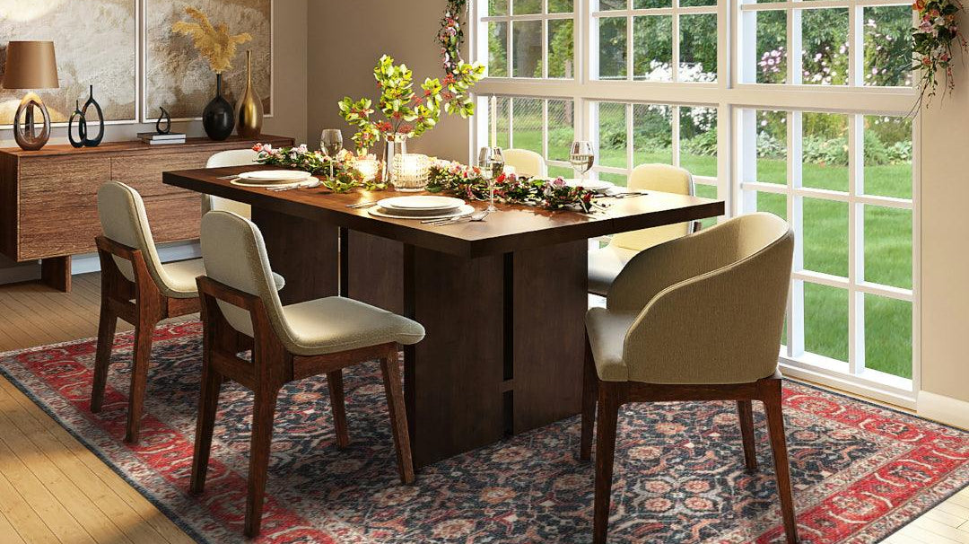 Turkish washable area rug with red and blue pattern in modern dining room with wood table