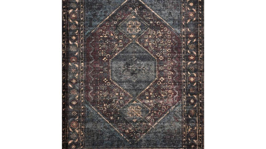 Charcoal machine washable area rug being dried after washing