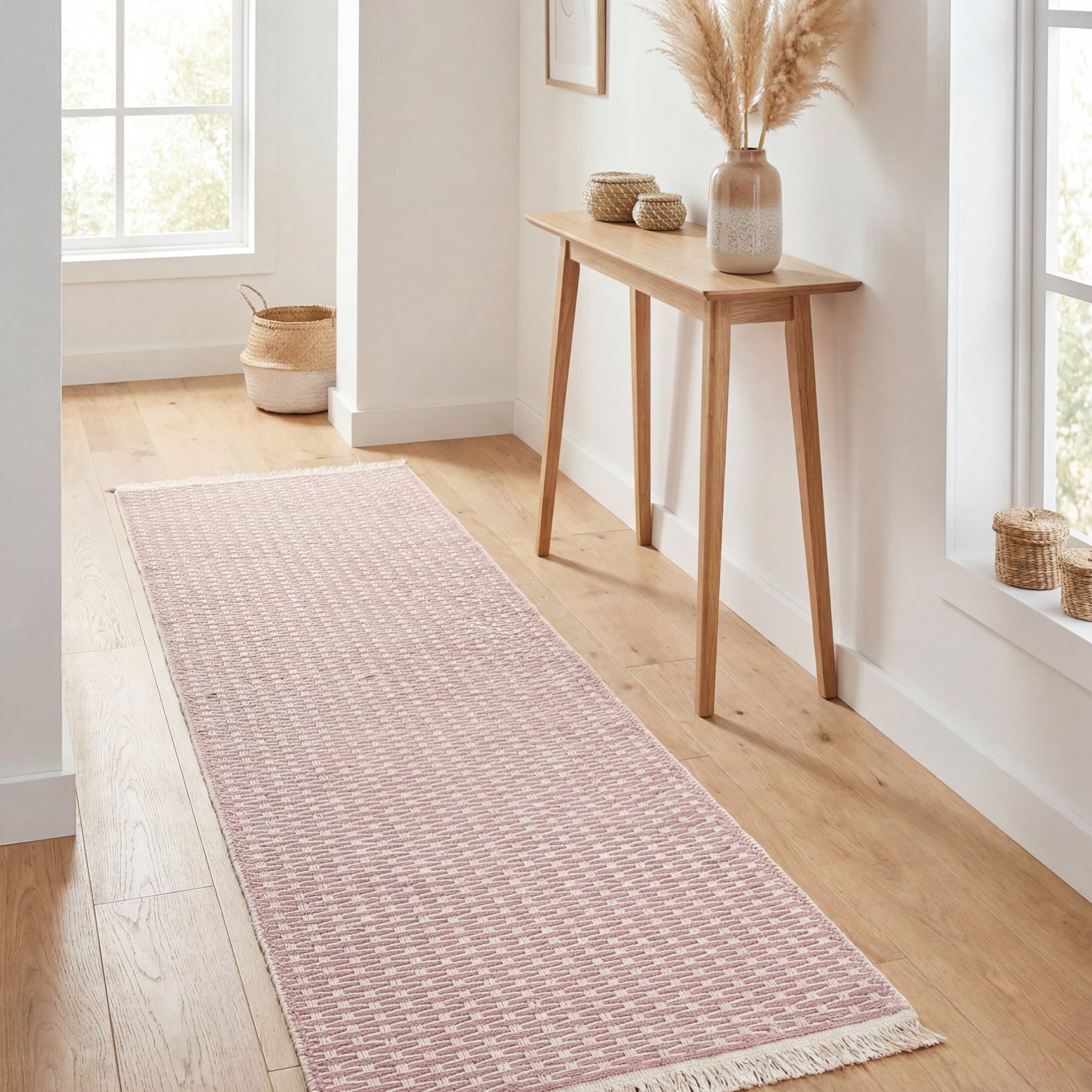 Pink geometric check washable runner rug styled in a modern hallway