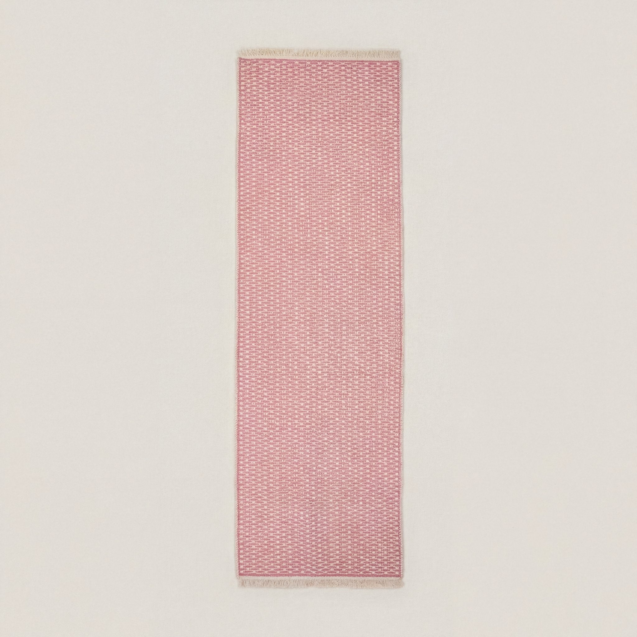 Pink geometric check machine washable runner area rug, top-down studio shot