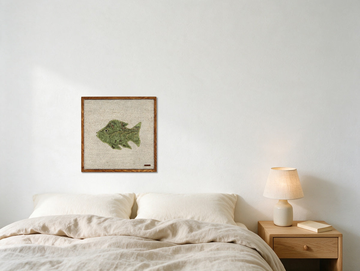 Olive Green Kilim Fish on Cream woven wall art shown hanging in a styled room, for scale - WA-FSH-OLI-5050-028