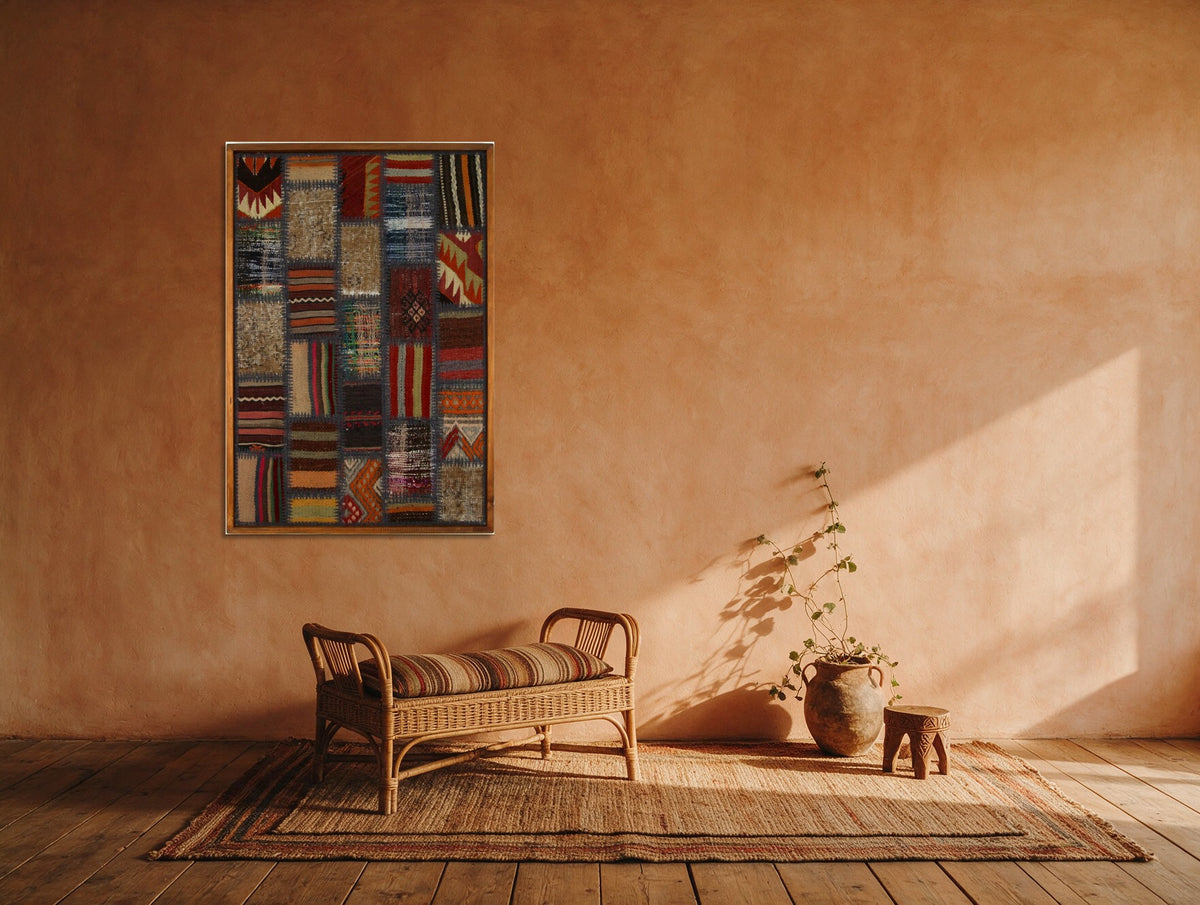 Grey Blue & Navy Kilim Patchwork on Rust & Cream woven wall art shown hanging in a styled room, for scale - WA-PCH-GRE-6595-072