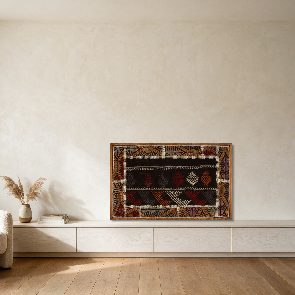 Rust & Ivory Bordered Kilim on Deep Brown woven wall art shown hanging in a styled room, for scale - WA-BRD-RUS-11069-077