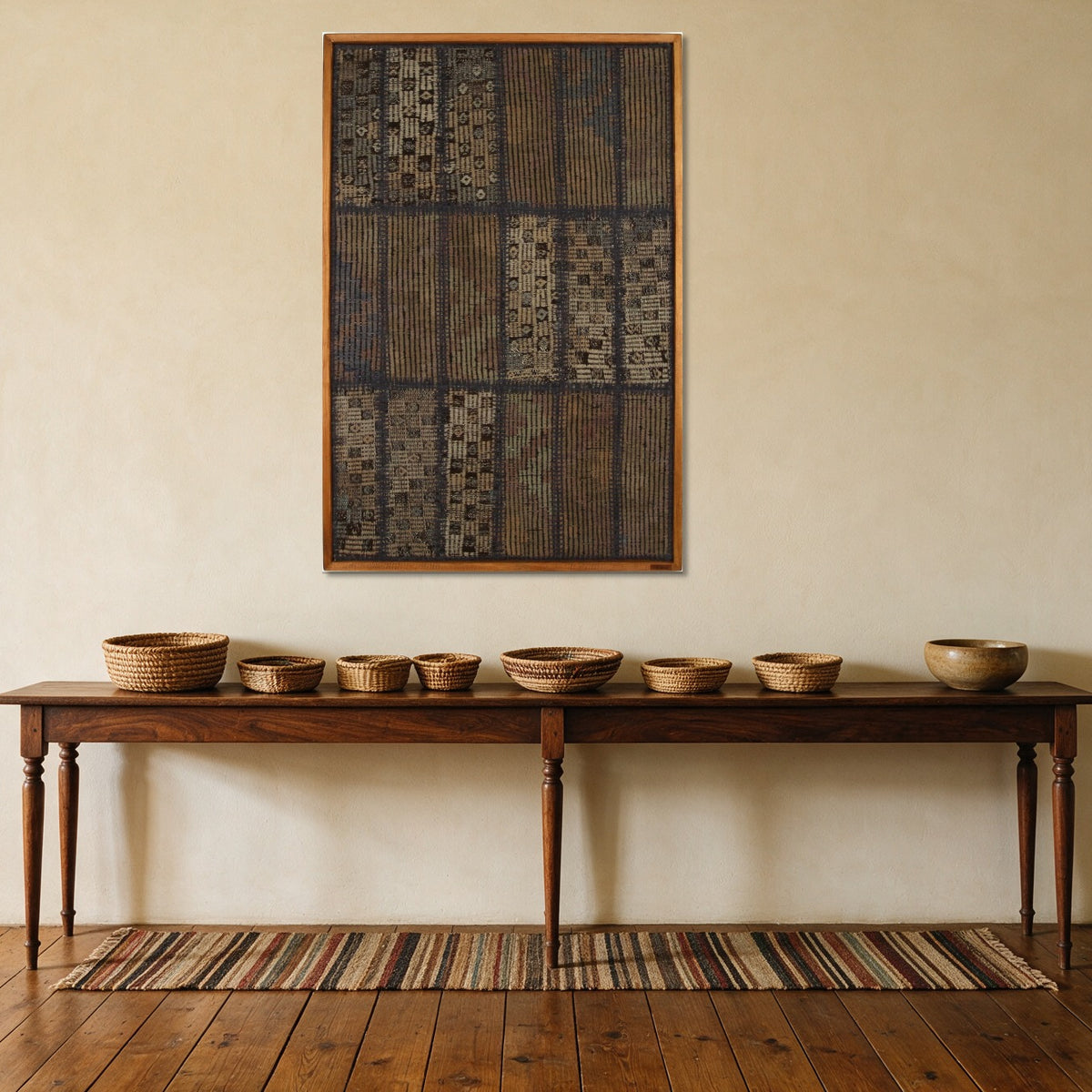 Muted Grey Kilim Patchwork on Indigo & Taupe woven wall art shown hanging in a styled room, for scale - WA-PCH-MUT-70105-081