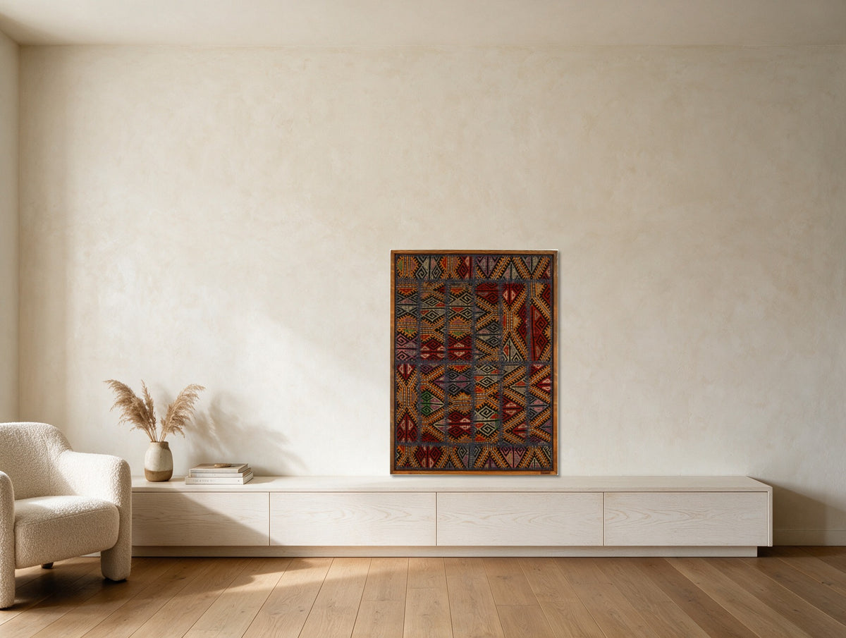 Navy & Red Tribal Kilim on Gold Ochre woven wall art shown hanging in a styled room, for scale - WA-TRB-NAV-7094-083