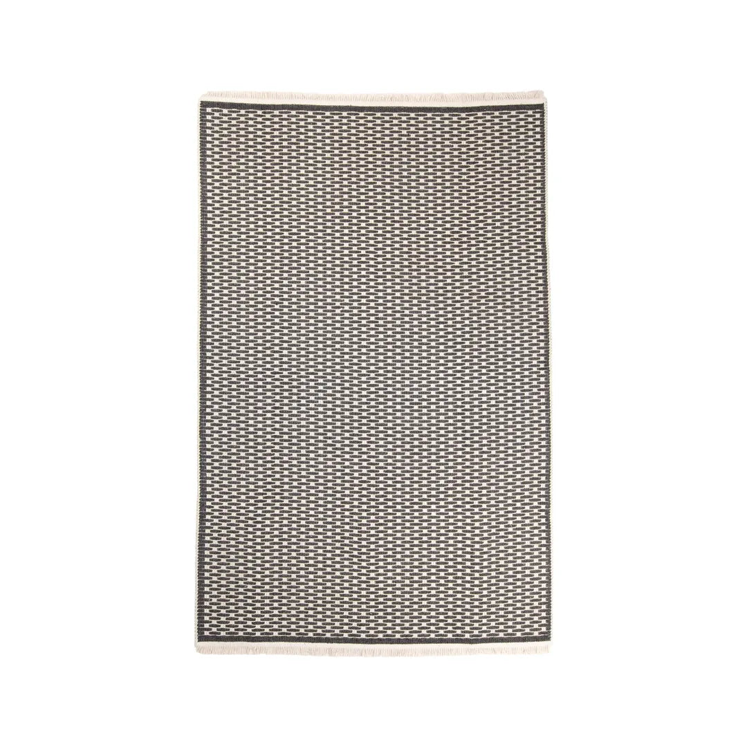 Anthracite geometric check low-pile machine washable area rug suited to a heated floor