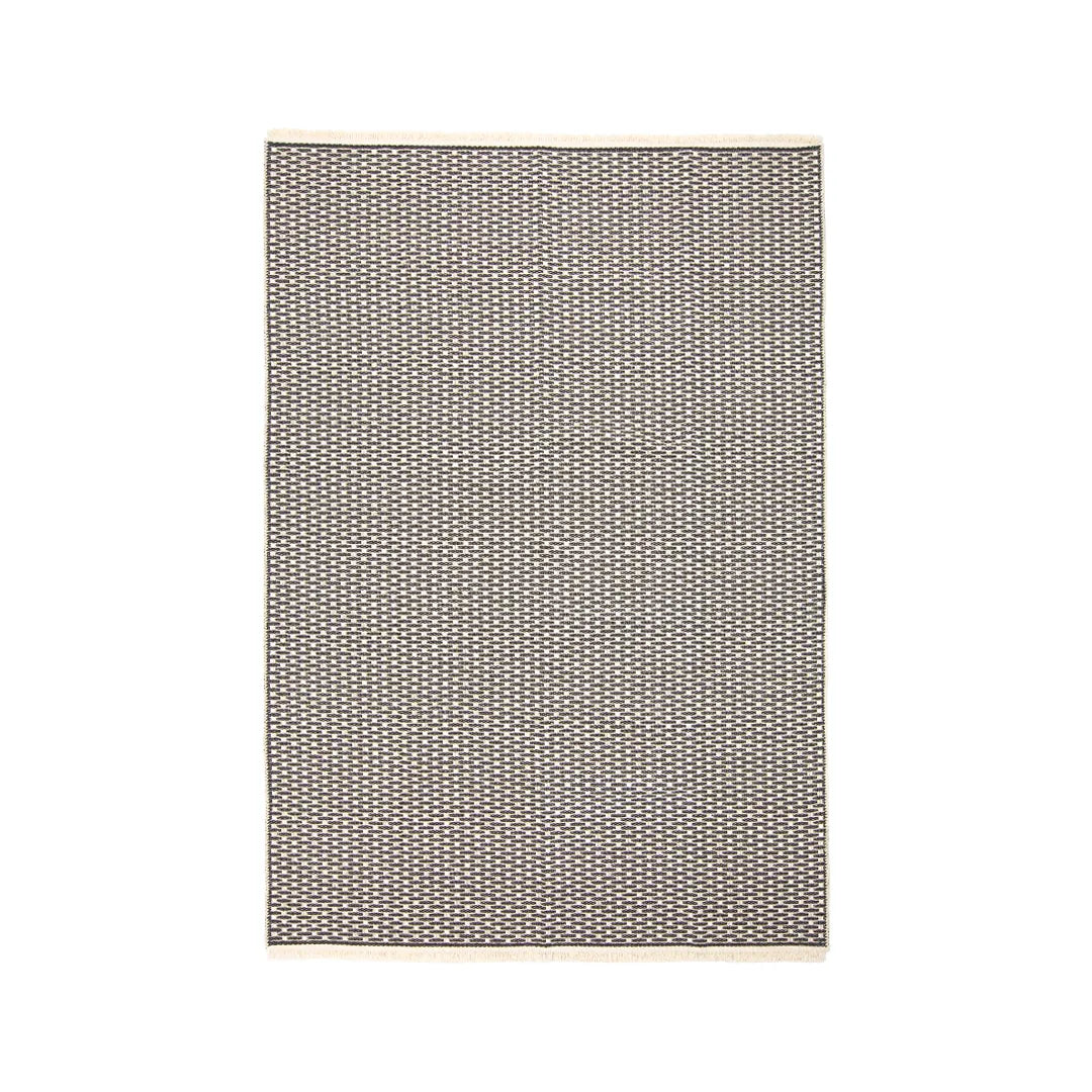 Black geometric check machine washable area rug with a tight low-pile flat weave that resists pilling