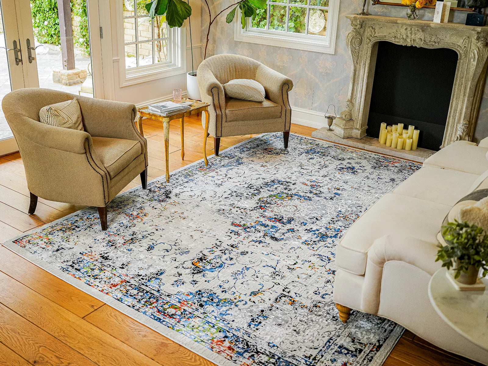 Modern living room with a colorful Turkish washable area rug on hardwood floor