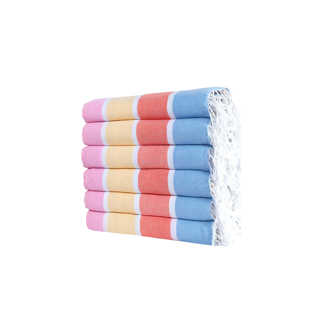 Six piece set of oversized rainbow Turkish cotton beach towels for a family