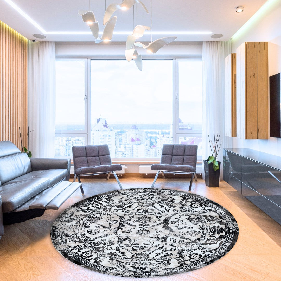 Modern living room with round Turkish washable area rug and large city-view windows