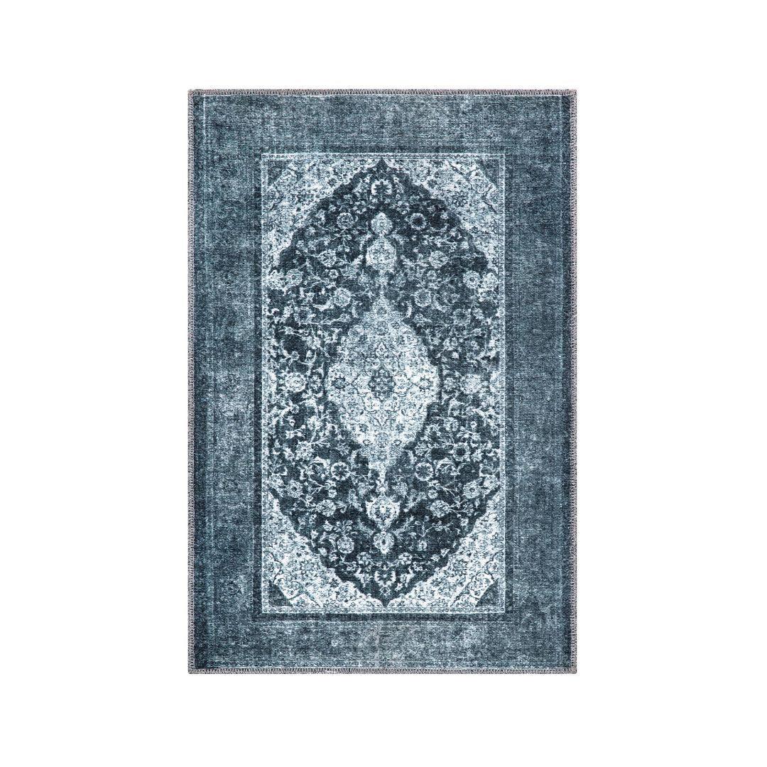 Area rug held flat on carpet with a non-slip rug pad underneath