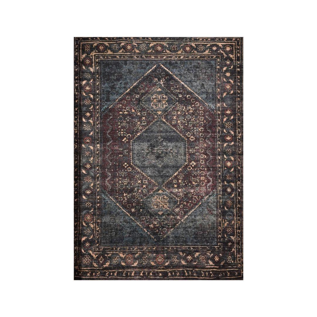 Area rug on carpet with a carpet-to-carpet rug pad underneath