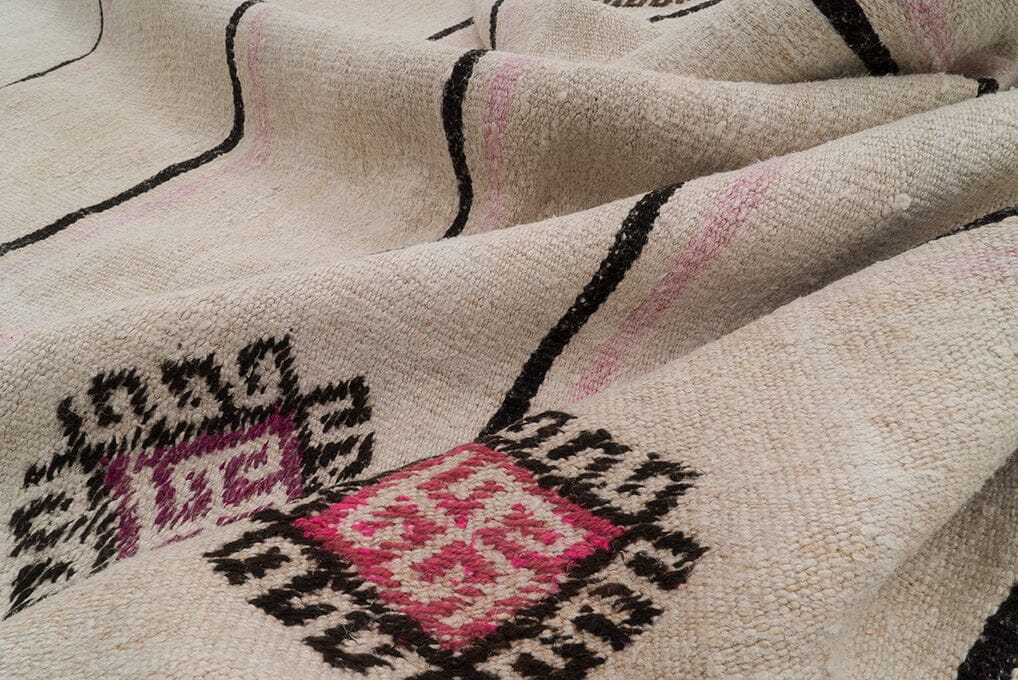  Close-up of unique geometric patterns on a hemp rug