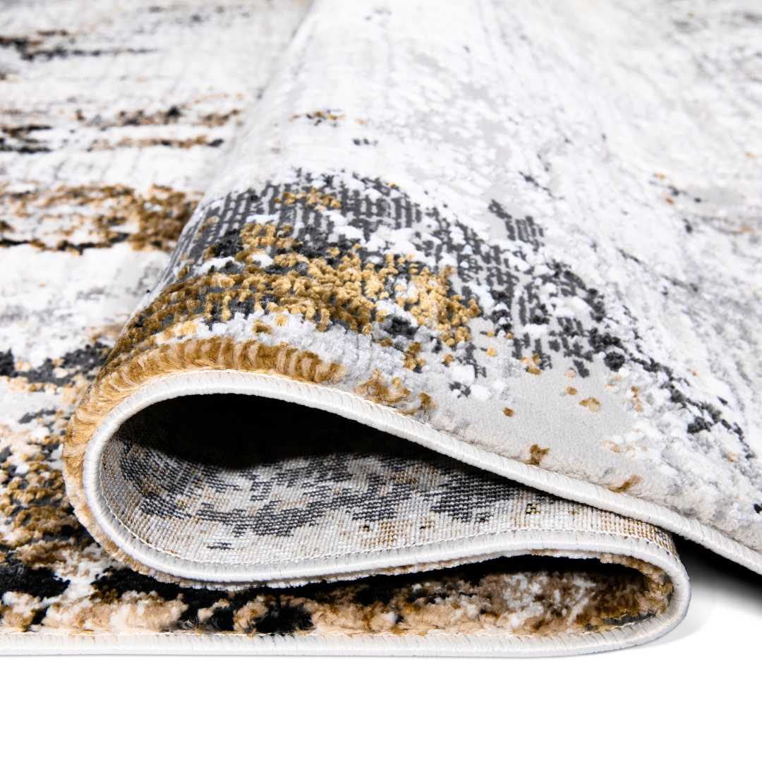 Modern abstract area rug in white, gray, and gold with high pile height, available in 5x7 and 8x10 sizes, Soft underfoot and durable for high traffic areas.