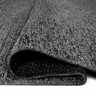 Machine washable solid dark gray area rug, 100% recycled material, kid and pet-friendly, eco-friendly