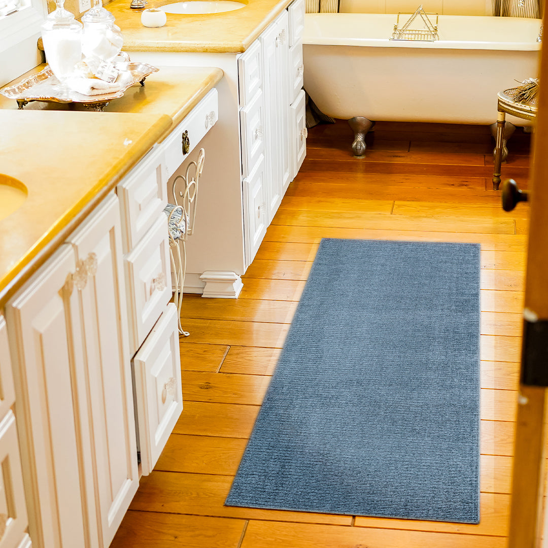 Machine washable solid blue area rug in slate blue color, made from recycled materials, kid and pet-friendly, available in sizes 2x6, 3x5, 5x7, 8x10