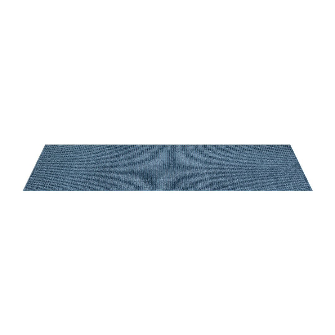 Machine washable solid blue area rug in slate blue color, made from recycled materials, kid and pet-friendly, available in sizes 2x6, 3x5, 5x7, 8x10