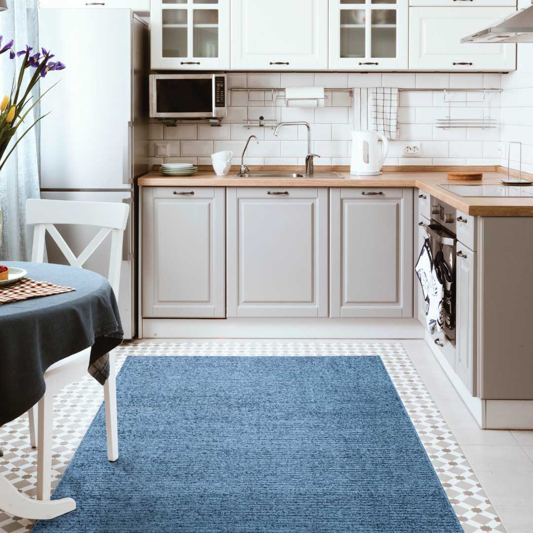 Machine washable solid blue area rug in slate blue color, made from recycled materials, kid and pet-friendly, available in sizes 2x6, 3x5, 5x7, 8x10