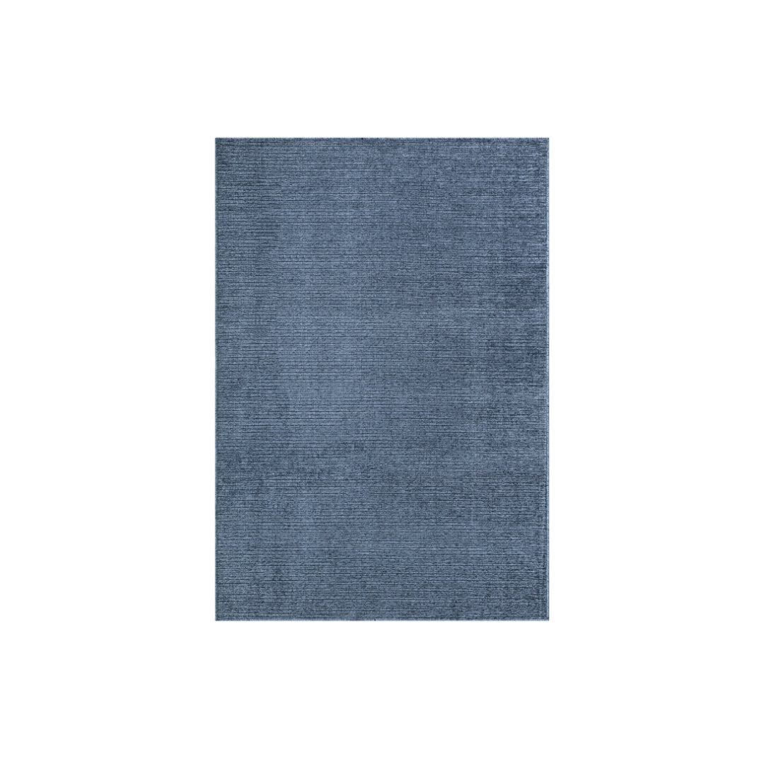 Machine washable solid blue area rug in slate blue color, made from recycled materials, kid and pet-friendly, available in sizes 2x6, 3x5, 5x7, 8x10