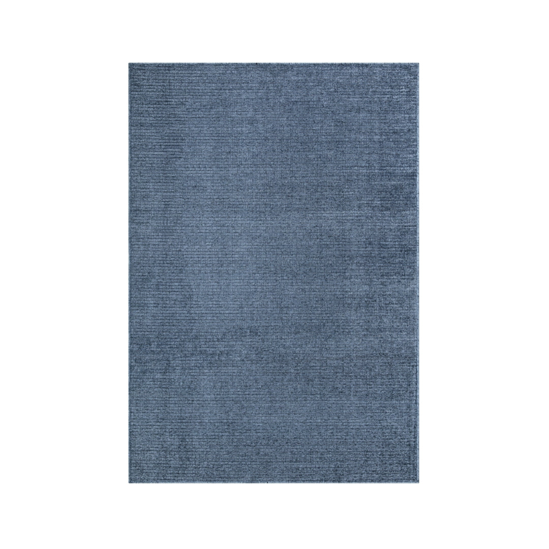 Machine washable solid blue area rug in slate blue color, made from recycled materials, kid and pet-friendly, available in sizes 2x6, 3x5, 5x7, 8x10