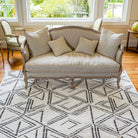 Machine washable reversible brown and white geometric area rug, eco-friendly recycled material, kid and pet friendly, tribal pattern, available in 3x5, 5x7, and 8x10 sizes