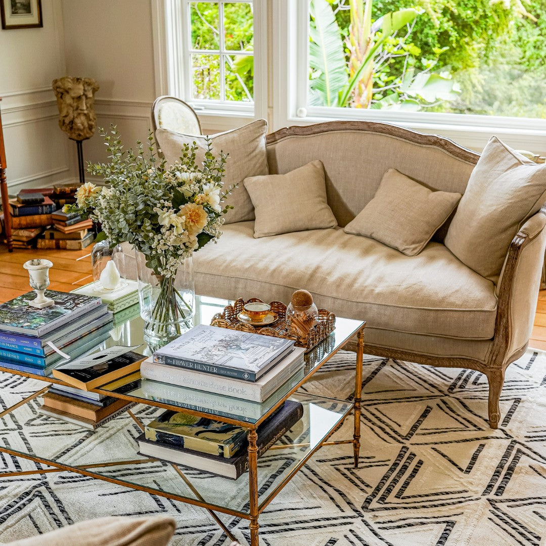 Machine washable reversible brown and white geometric area rug, eco-friendly recycled material, kid and pet friendly, tribal pattern, available in 3x5, 5x7, and 8x10 sizes