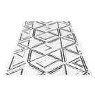 Machine washable reversible brown and white geometric area rug, eco-friendly recycled material, kid and pet friendly, tribal pattern, available in 3x5, 5x7, and 8x10 sizes