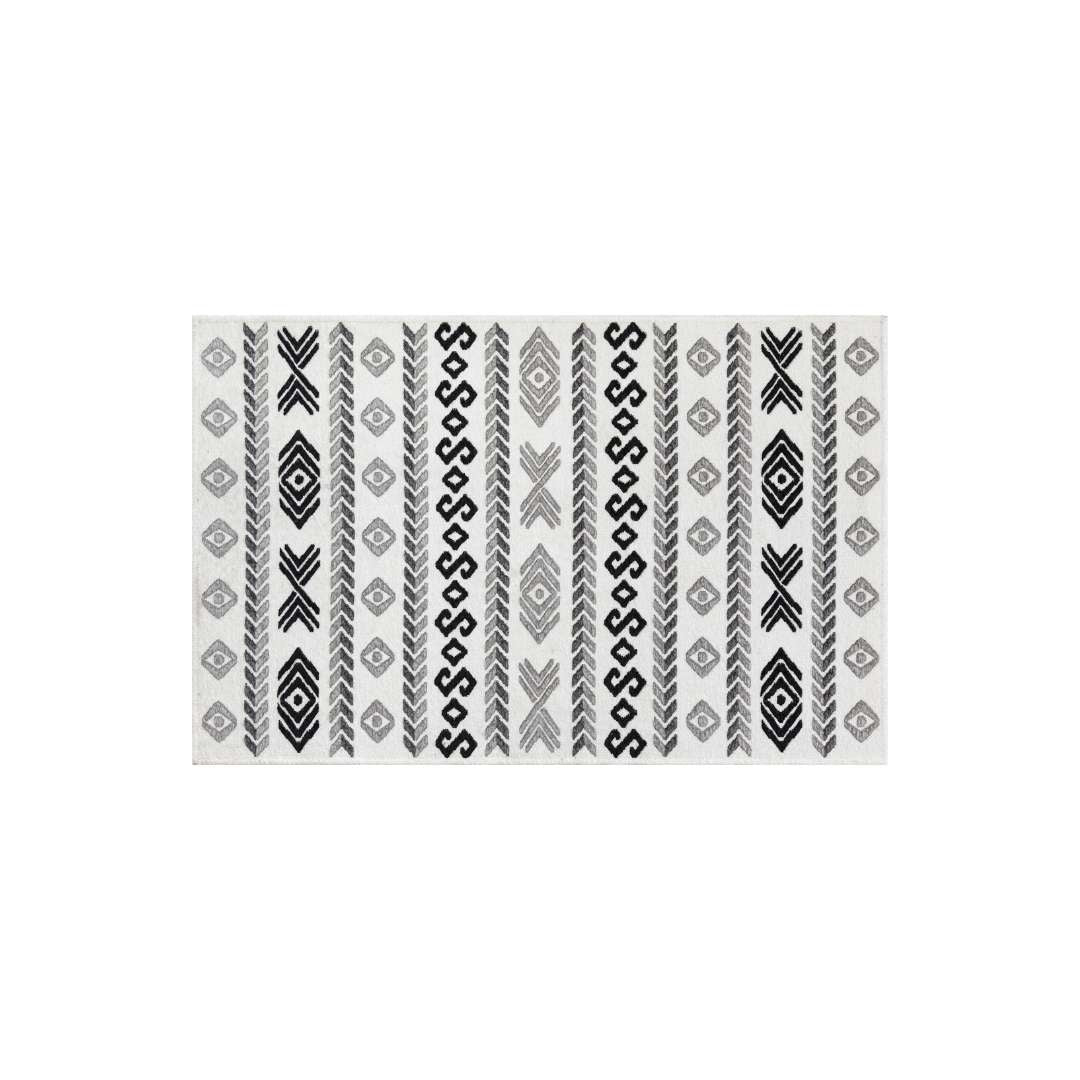 Machine washable reversible black and white geometric area rug, available in 3x5, 5x7, 8x10, made from recycled materials, kid and pet friendly