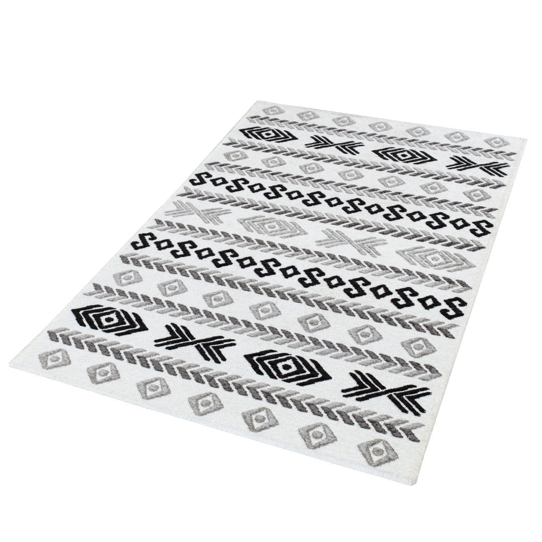 Machine washable reversible black and white geometric area rug, available in 3x5, 5x7, 8x10, made from recycled materials, kid and pet friendly