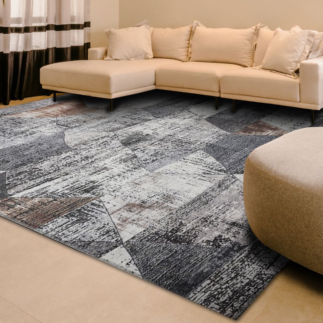 Machine washable geometric pattern distressed blue and gray area rug available in 2x6, 5x7, 8x10 sizes. Kid and pet friendly, made from recycled materials. Suitable for contemporary or modern living rooms and high traffic areas.