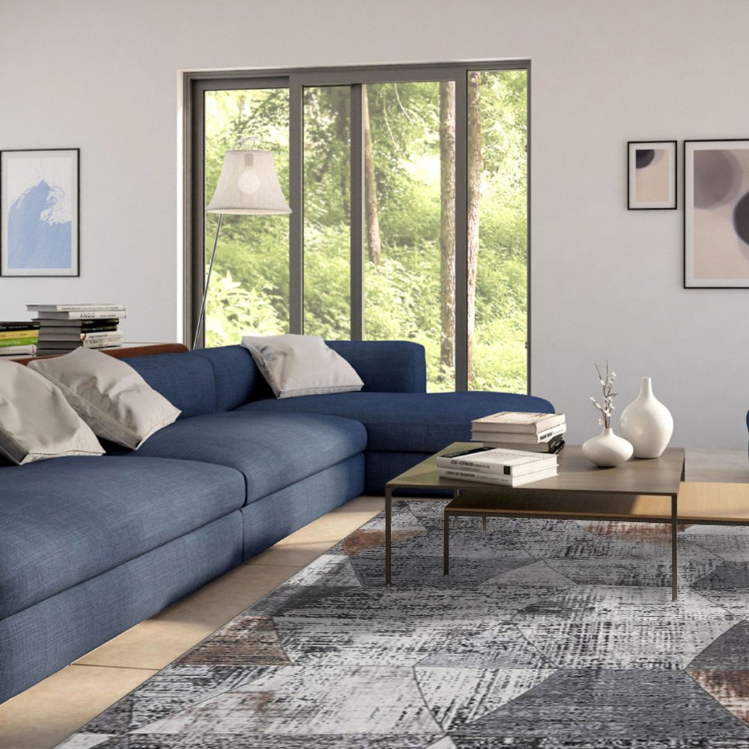 Machine washable geometric pattern distressed blue and gray area rug available in 2x6, 5x7, 8x10 sizes. Kid and pet friendly, made from recycled materials. Suitable for contemporary or modern living rooms and high traffic areas.