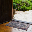 Machine washable Oriental rug with vintage distressed medallion design, navy gold and antique blue-gold color, available in 2x3 and 3x5 sizes, pet and kid friendly, made from recycled materials, features a decorative border.