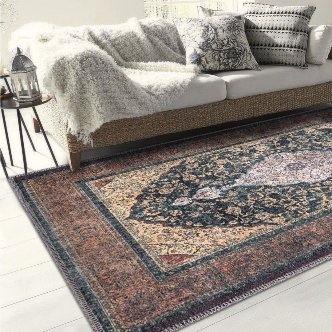 Machine washable Oriental rug with vintage distressed medallion design, navy gold and antique blue-gold color, available in 2x3 and 3x5 sizes, pet and kid friendly, made from recycled materials, features a decorative border.