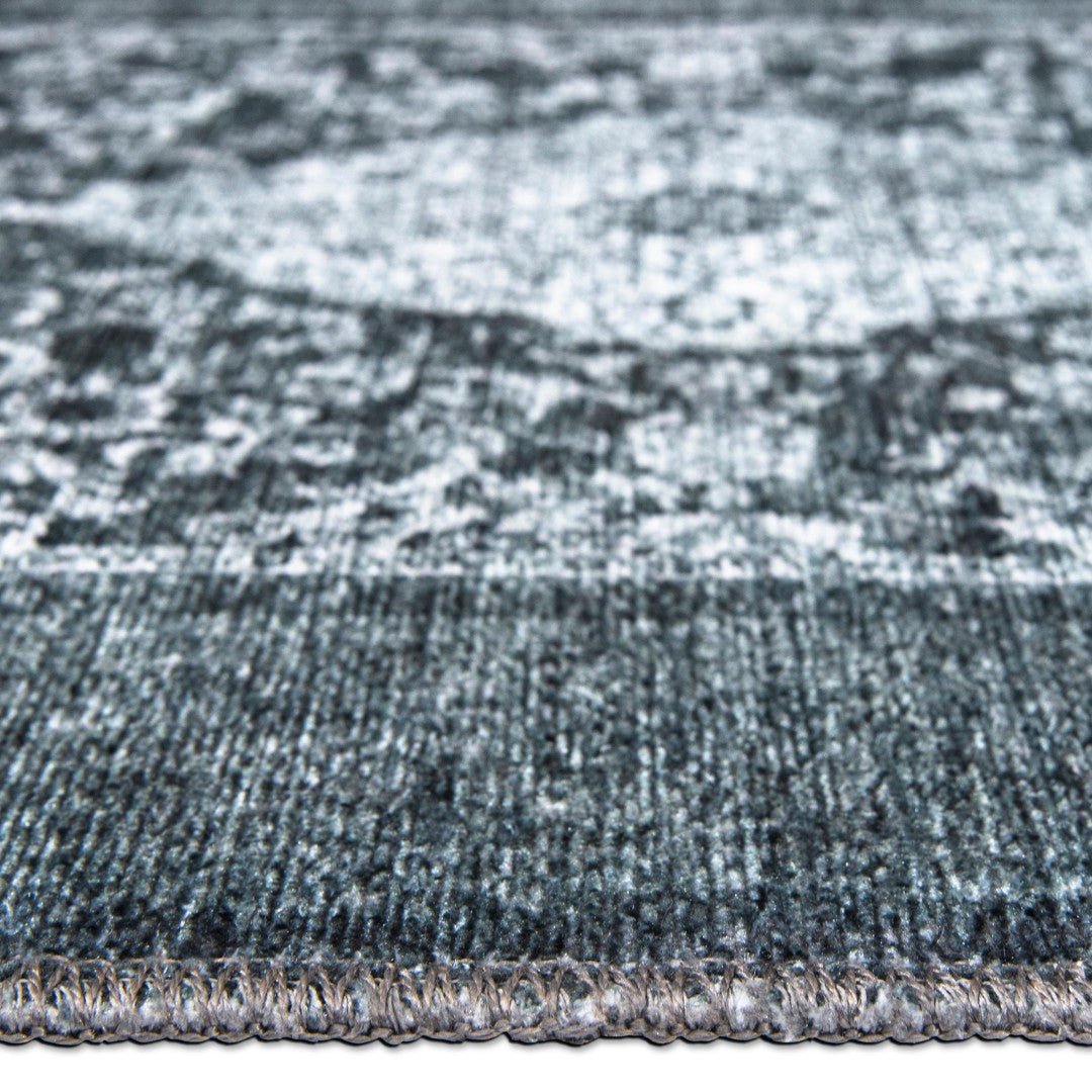 Machine washable blue and gray distressed area rug made from recycled materials, kid and pet friendly