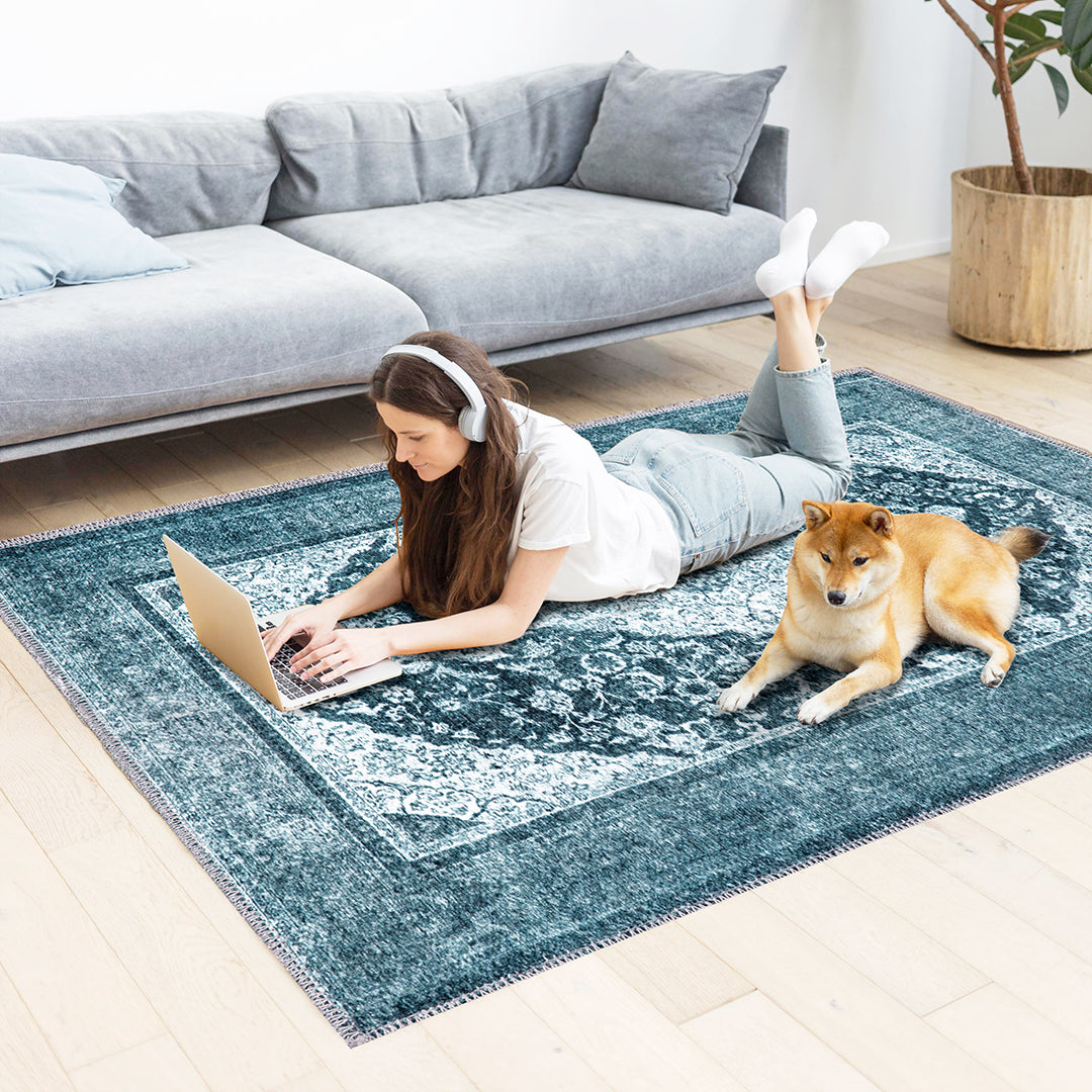 Machine washable blue and gray distressed area rug made from recycled materials, kid and pet friendly