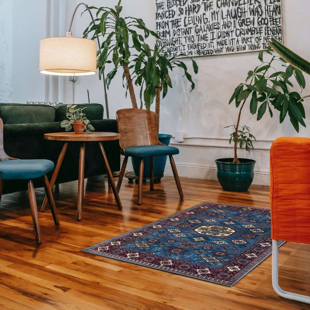 Machine washable blue area rug in navy, indigo, cream, light blue, and red colors, made from eco-friendly recycled materials. Kid and pet friendly, ideal for high-traffic areas. Available sizes: 2x3, 3x5, 5x30