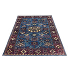 Machine washable blue area rug in navy, indigo, cream, light blue, and red colors, made from eco-friendly recycled materials. Kid and pet friendly, ideal for high-traffic areas. Available sizes: 2x3, 3x5, 5x37