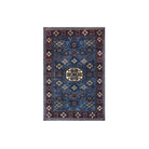 Machine washable blue area rug in navy, indigo, cream, light blue, and red colors, made from eco-friendly recycled materials. Kid and pet friendly, ideal for high-traffic areas. Available sizes: 2x3, 3x5, 5x7