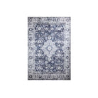 Machine washable area rug in blue and white, recycled material, available in 5x7 and round size, kid-friendly, pet-friendly, eco-friendly design, navy blue, white, distressed blue tones