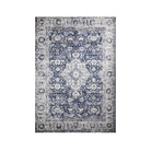 Machine washable area rug in blue and white, recycled material, available in 5x7 and round size, kid-friendly, pet-friendly, eco-friendly design, navy blue, white, distressed blue tones