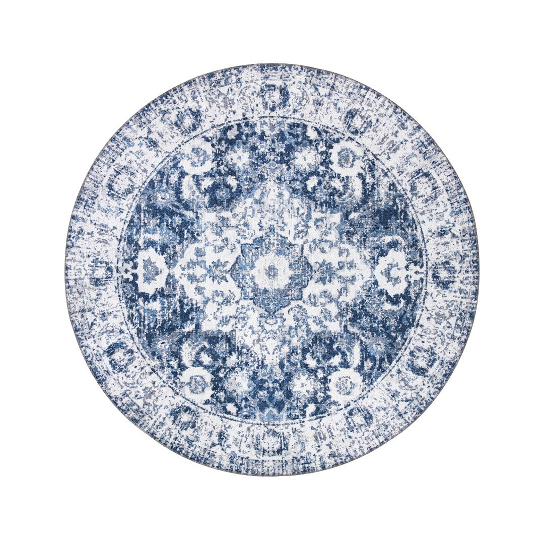 Machine washable area rug in blue and white, recycled material, available in 5x7 and round size, kid-friendly, pet-friendly, eco-friendly design, navy blue, white, distressed blue tones