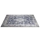 Machine washable area rug in blue and white, recycled material, available in 5x7 and round size, kid-friendly, pet-friendly, eco-friendly design, navy blue, white, distressed blue tones