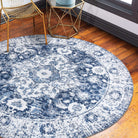 Machine washable area rug in blue and white, recycled material, available in 5x7 and round size, kid-friendly, pet-friendly, eco-friendly design, navy blue, white, distressed blue tones