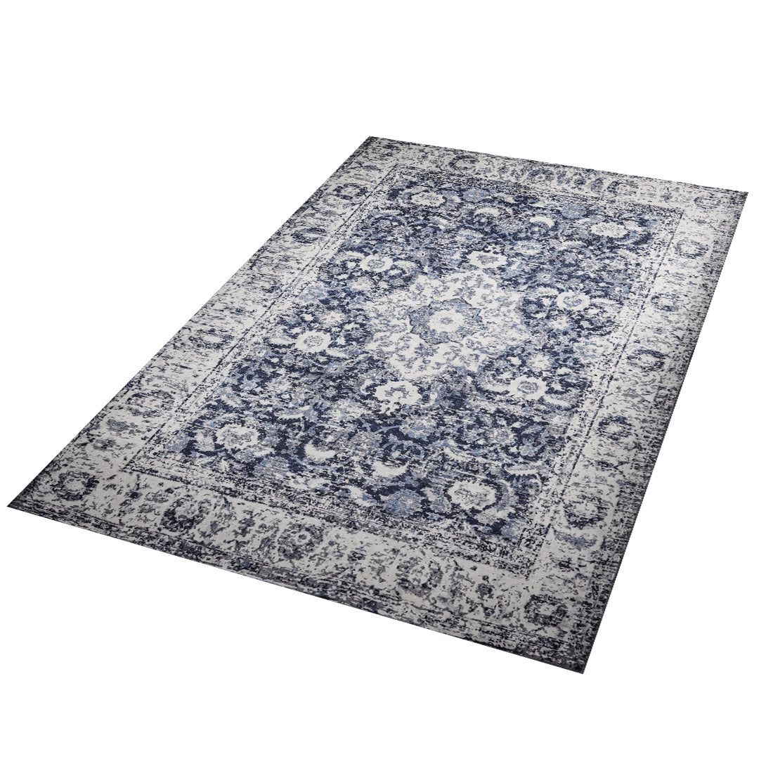 Machine washable area rug in blue and white, recycled material, available in 5x7 and round size, kid-friendly, pet-friendly, eco-friendly design, navy blue, white, distressed blue tones