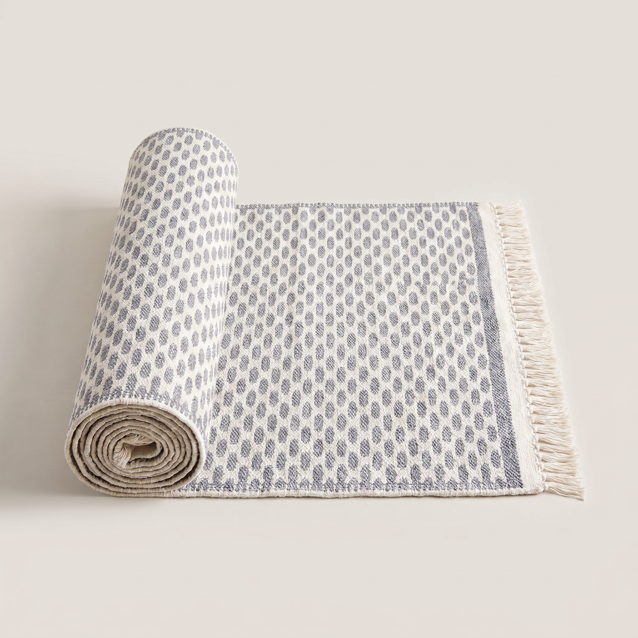 Light gray geometric check washable runner rug rolled up, lightweight and easy to handle