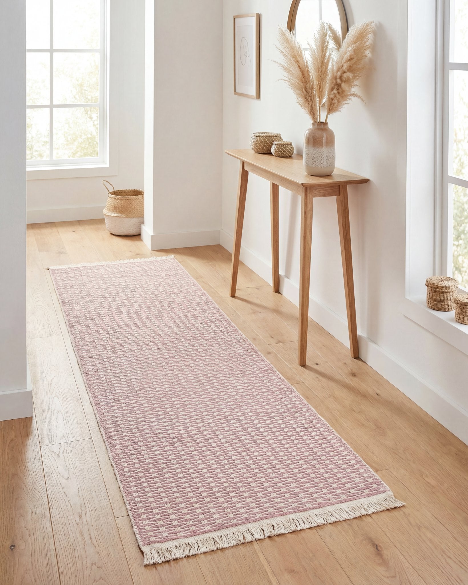 Pink geometric check washable runner rug styled in a modern hallway