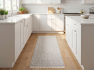 Light gray geometric check washable runner rug on wood floor in a modern kitchen