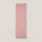 Pink geometric check machine washable runner area rug, top-down studio shot