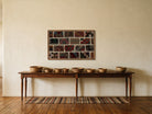 Red, Teal & Black Kilim Patchwork on Multicolor woven wall art shown hanging in a styled room, for scale - WA-PCH-RED-8855-006